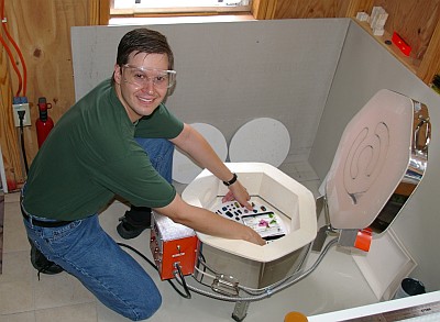 Kevin Rolfes with the kiln in the Green Hills Arts studio